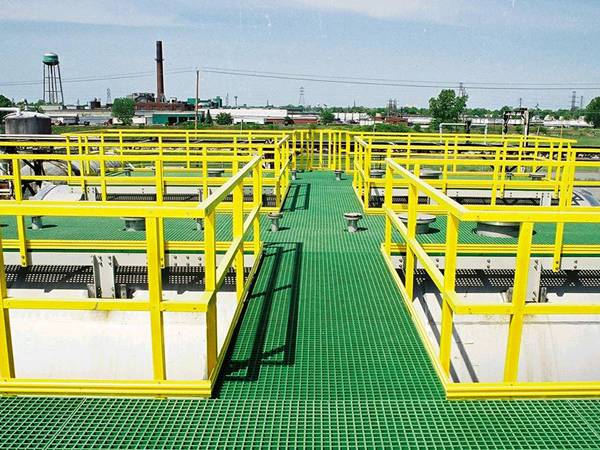 Green FRP/GRP grating is installed in the sewage plant as walkways.