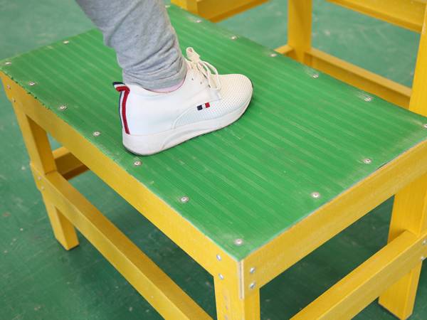 The non-slip mat is fixed to the FRP/GRP insulated stool.