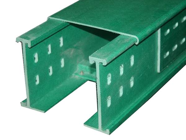A perforated green FRP/GRP ladder tray with cover.