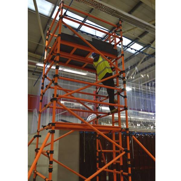 The worker is climbing the vertical ladder to reach the working platform.