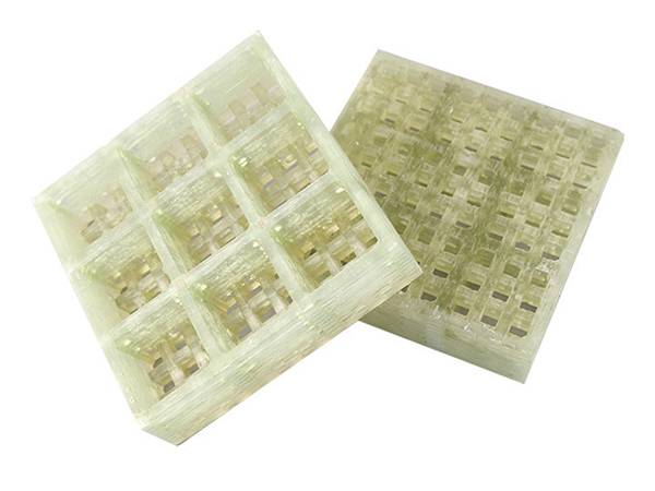A piece of transparent color molded FRP/GRP grating with micro meshes.